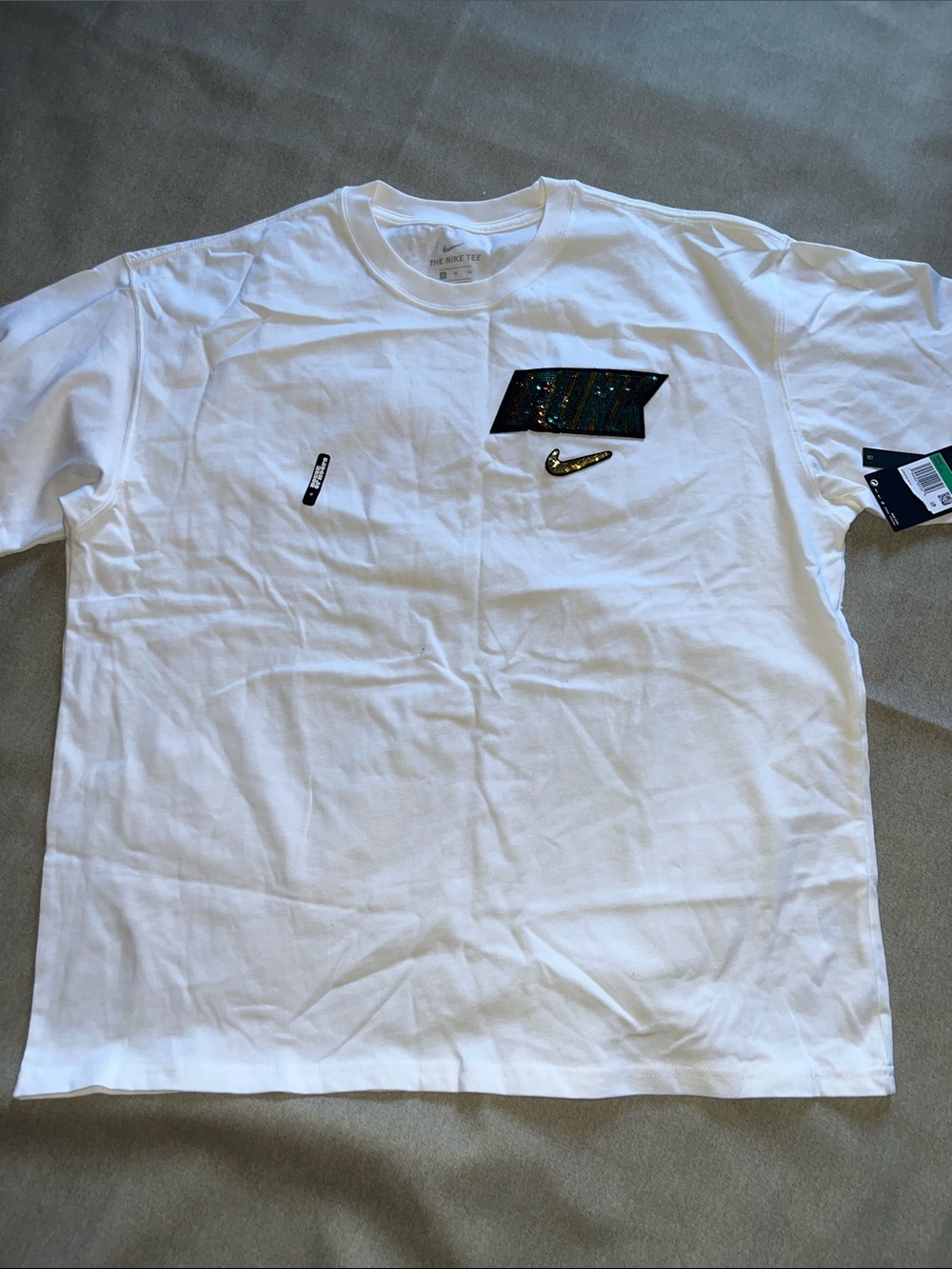Nike White Short Sleeve Tee with Iridescent Logo and Gold Swoosh